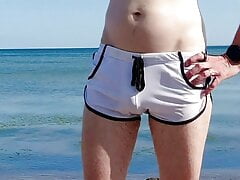 Piss in my swim shorts at the public beach