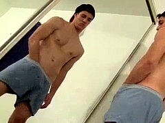 young jock Kyle Mann enjoys stroking pipe in the mirror
