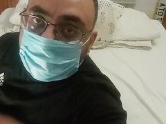 Masturbating quietly at home in bedroom