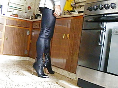 Walking with shiny leggings and heels.
