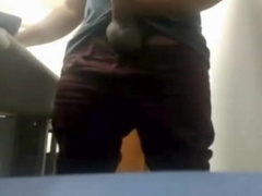 Brazilian Daddy Strokes His Big Uncut Cock at Work