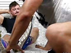 Hunk strokes his dick while having feet and toes licked