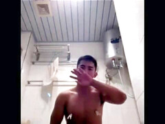 asian beefy fellow jerks off his cock in shower Part 1