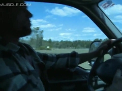 Beefy cowboy gets trussed up to the front of a van