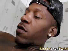 dark-hued boy pops face