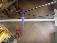 Italian crossdresser in golden attire enjoys pleasuring himself with large toys