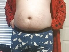 Fat boy playing with nipple clamps and my little cock