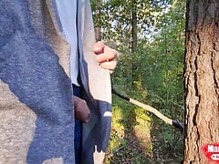 On a walk in the forest, pissing under a tree