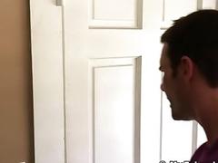 Muscular gay hunk has his socks and bare feet worshiped