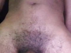 Balls hanging full of cum