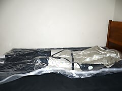 Aug 24 2023 - VacPacked with my PVC aprons, silver latex jacket and thick quilt