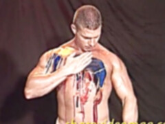 JUNKYARD man Dillon Day paints his nude assets