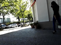 shemale trans high heels walking on street