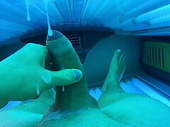 Cumshot in public solarium