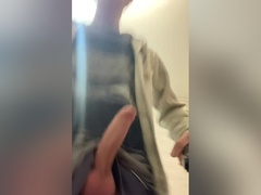 A Guy In A Winter Hat With Earflaps And A Blue Jacket, Masturbates His Penis And Cums With Hot Sperm